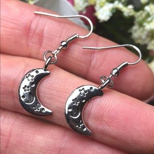 Handmade silver celestial moon and star earrings